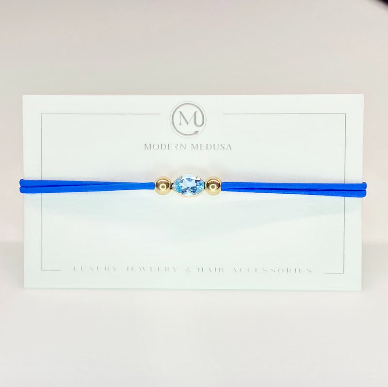 Blue Belle - 14k Solid Gold Blue Topaz Oval Cut Band Ring