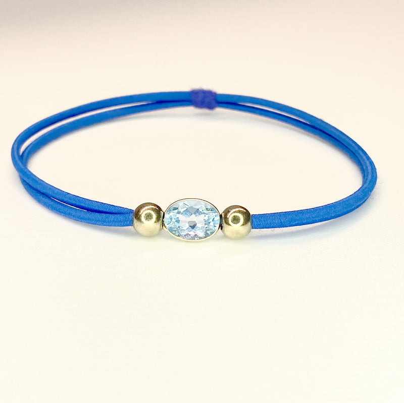Blue Belle - 14k Solid Gold Blue Topaz Oval Cut Band Ring